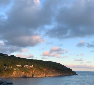 A holiday photo of the Welsh coast at sunset. 