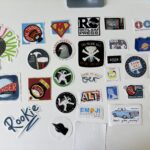 Photo of laptop stickers arranged on my desk